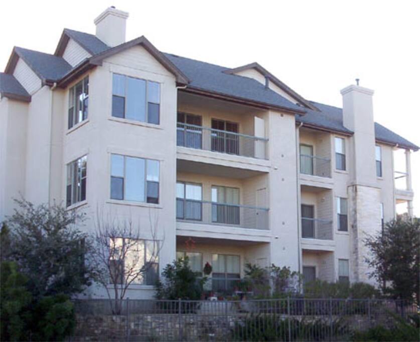 Third floor, quiet, nature-filled area with trails and pond on property.