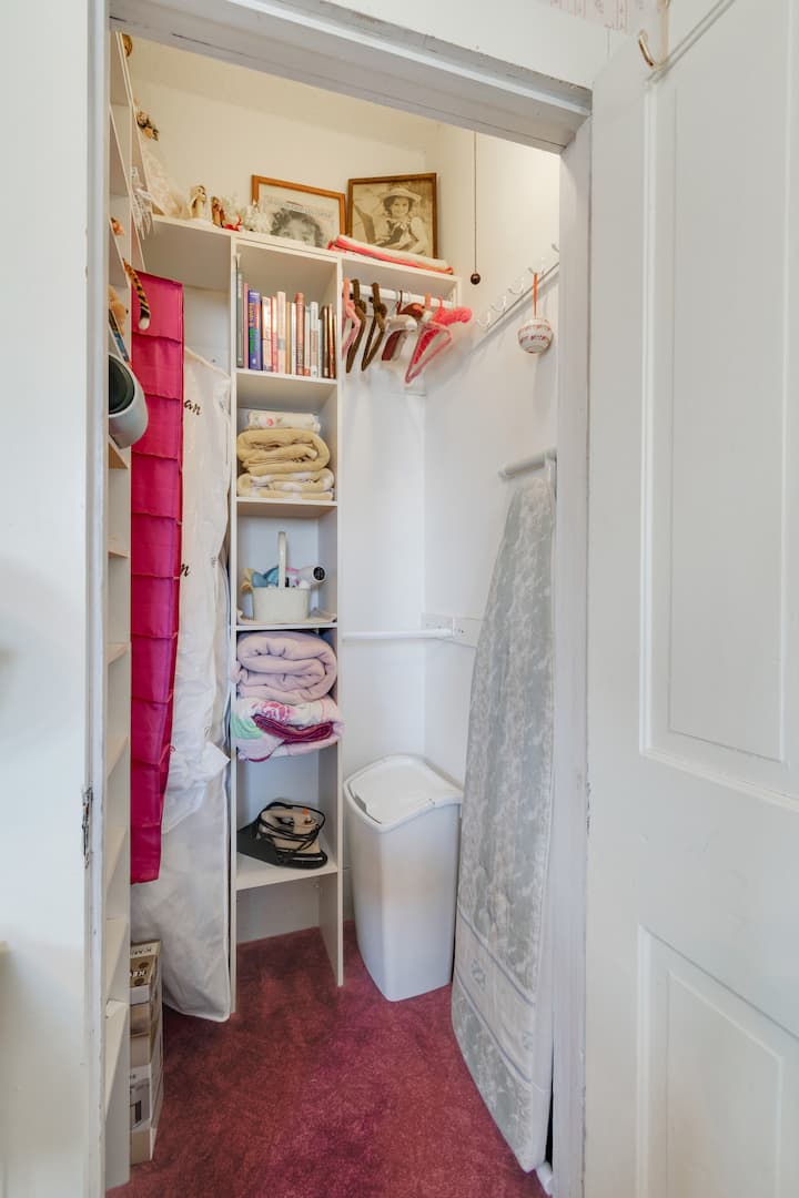 Towels, bathroom supplies, iron, hairdryer, extra bedding. 