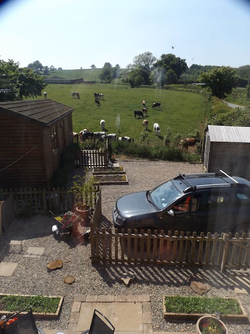 The cabin is located in the garden of an old toll house with parking to the front