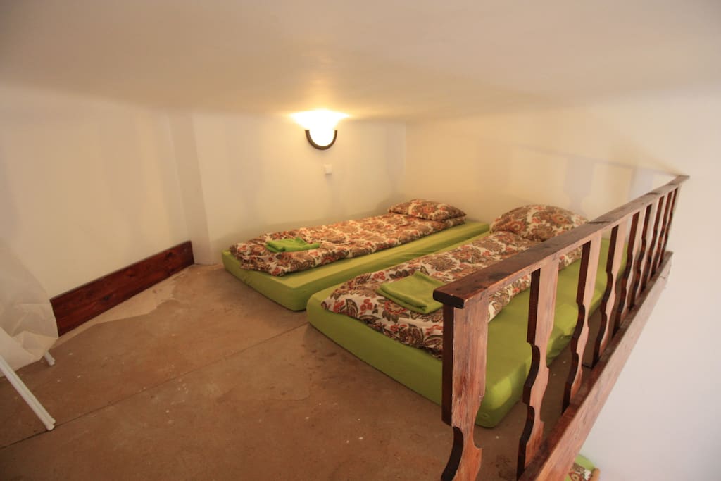private bedroom for 4 persons , 2 beds down and 2 beds up, writing desk , wardrobe and settee