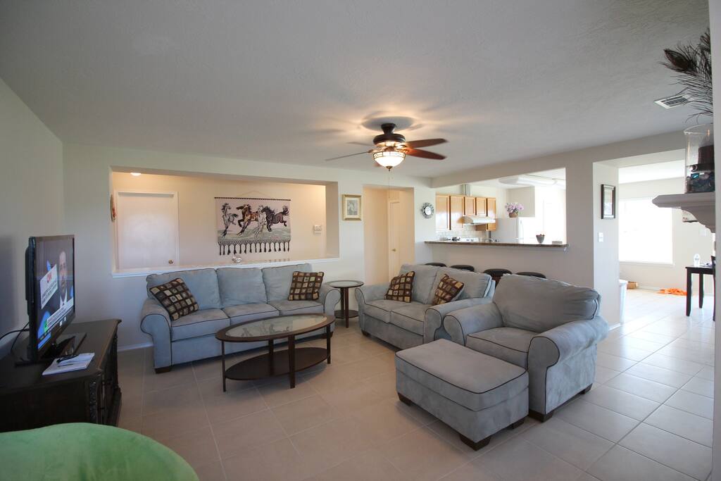Step inside into an open and bright living room with views of the lake, a fireplace, a TV with 150 channel choices. Free WIFI available in all rooms.