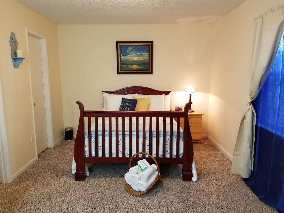 Bedroom- Queen size bed, walk-in closet with hangers, Iron and ironing board