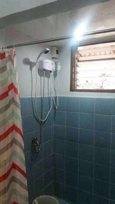 Door 1 - 2 single beds with AC, wifi, cable TV and private bathroom with hot & cold shower