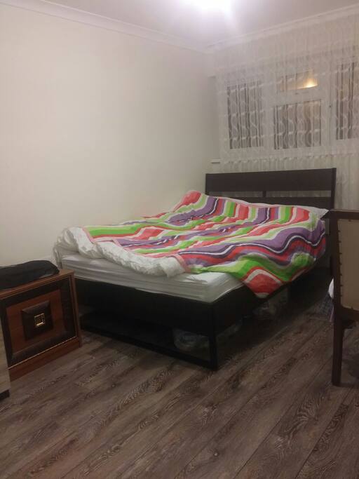 Wood floor very clean room. Youg couple living house