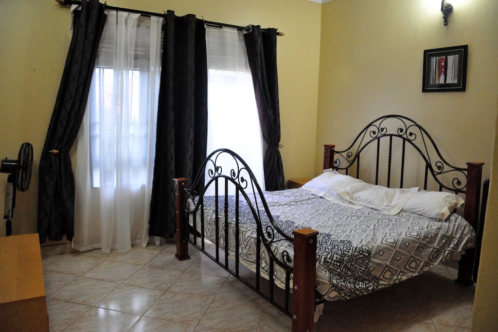 Master bedroom with king sized bed