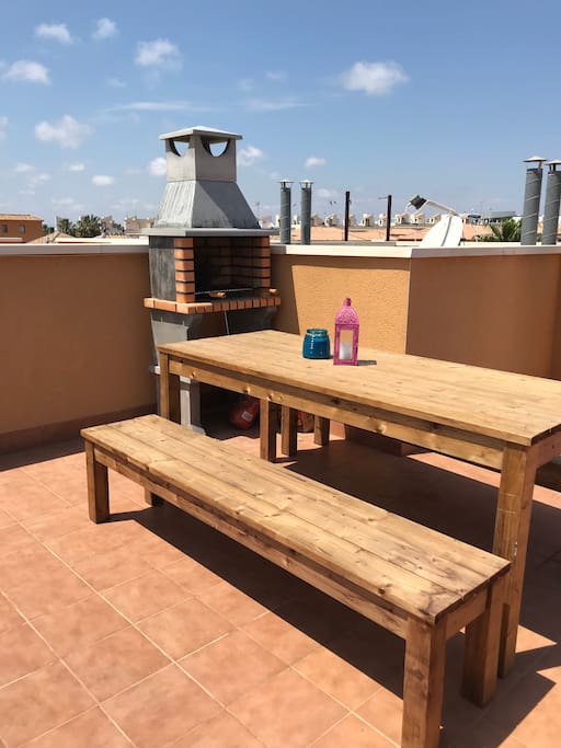 Large roof terrace, equipped with table & benches for up to 8 people, sun loungers and chiminea/bbq. Great for sunbathing in the day or having fun evening bbqs.
