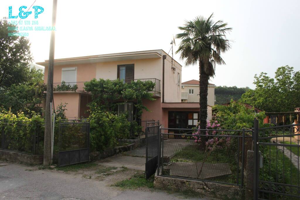 House and house gate entrance and parking