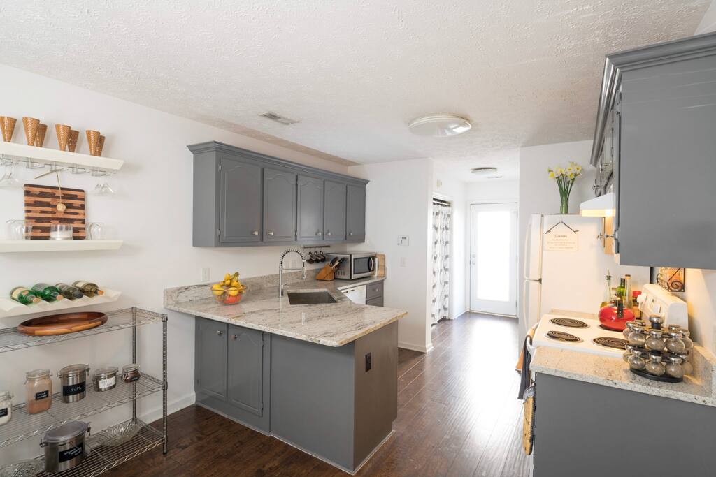 Full kitchen stocked with all the supplies you could need to cook a delicious meal!