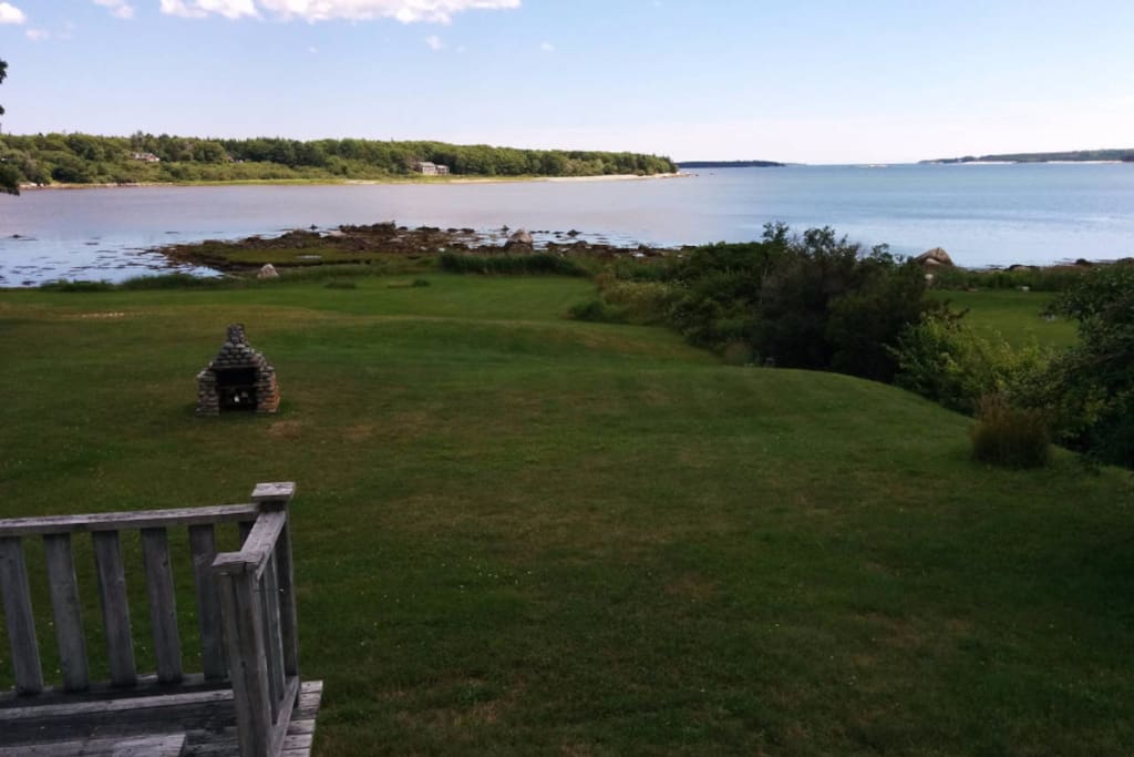 View from the deck (outdoor fireplace in yard)