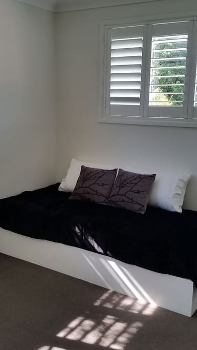 Your private lounge room on the upper level, could also be used as a single room. Windows on north and east sides.