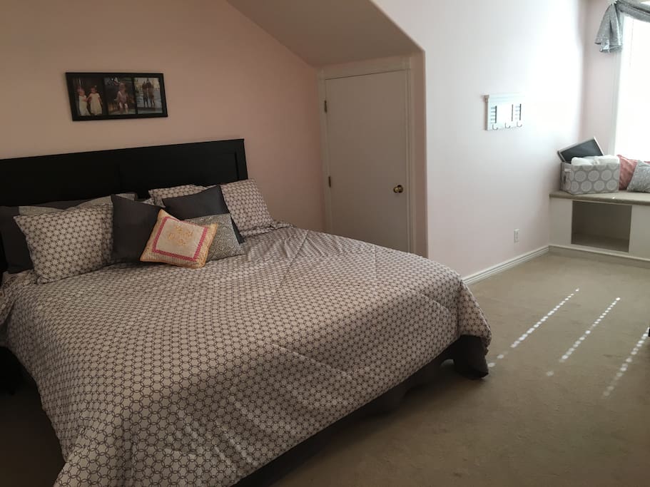 King size bed with lots of floor space for kids.
