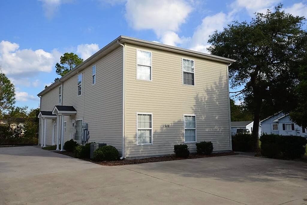 Front entrance to the duplex and parking area.