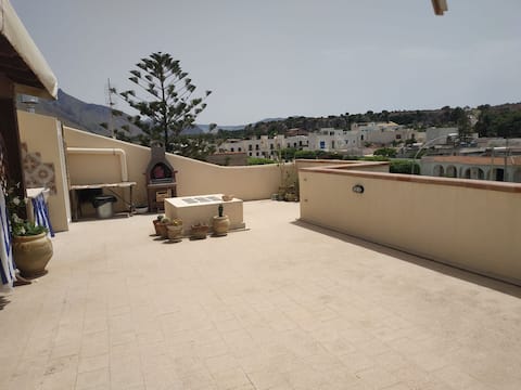Successful Airbnb property: Attic with large terrace and barbecue in San Vito Lo Capo