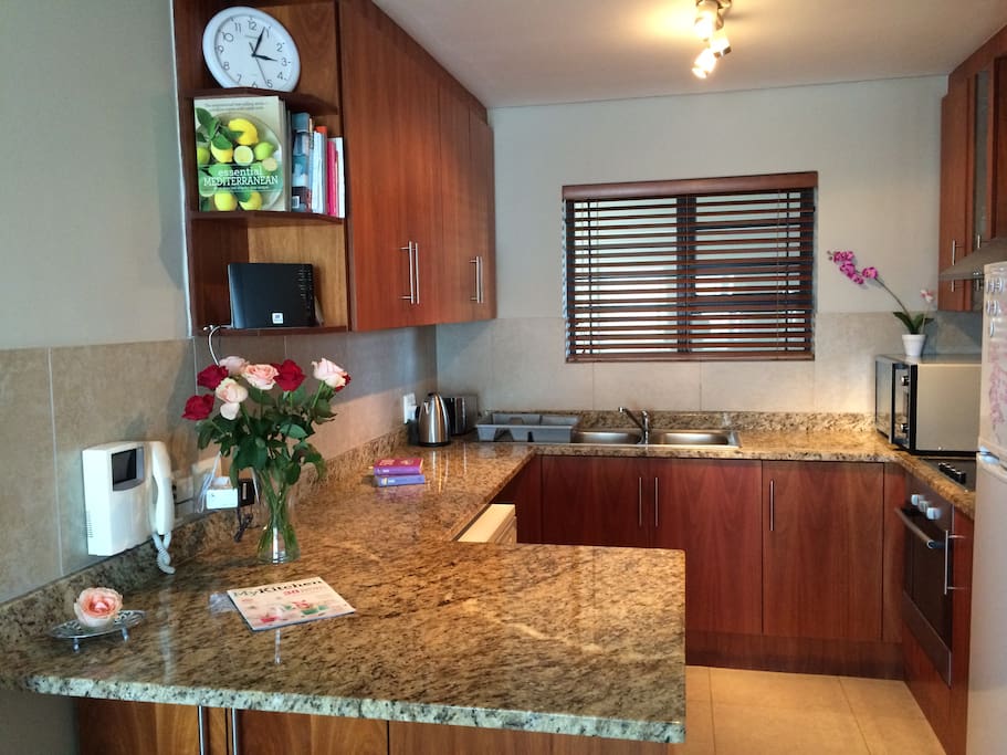 Spacious kitchen with lots of counter space.