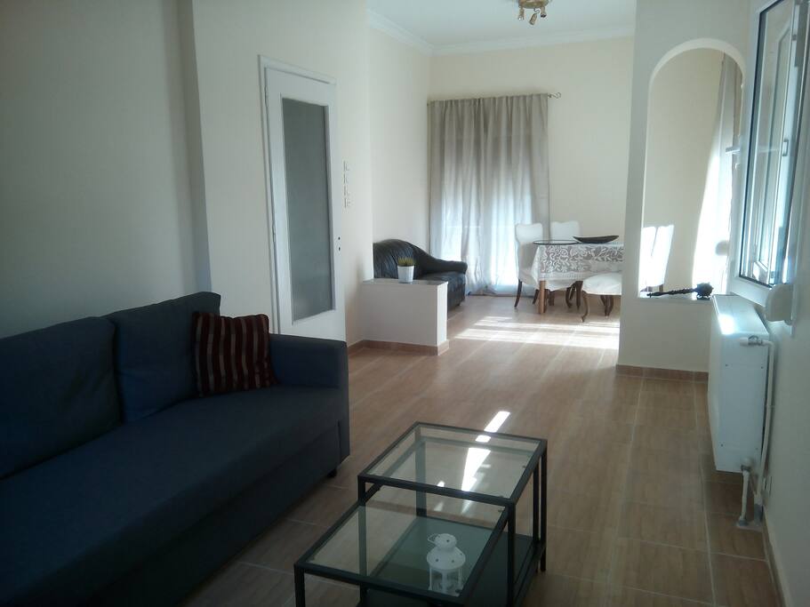 Spacious living room full of Attica's sun light