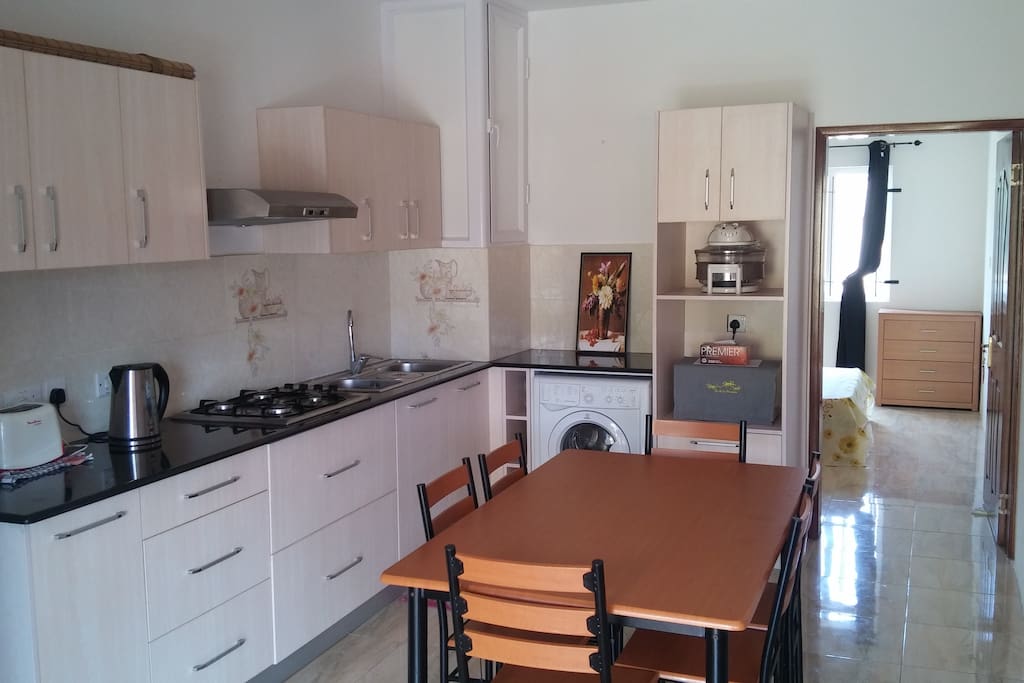 Fully Equipped Kitchen and Dinning Room - Washing Machine - Fridge / Freezer, Kitchen cooking utensils, microwave, kettle, toaster, cooker, ...
Dinning Table with 6 chairs
Plus another external table with 4 chairs for the porch / balcony