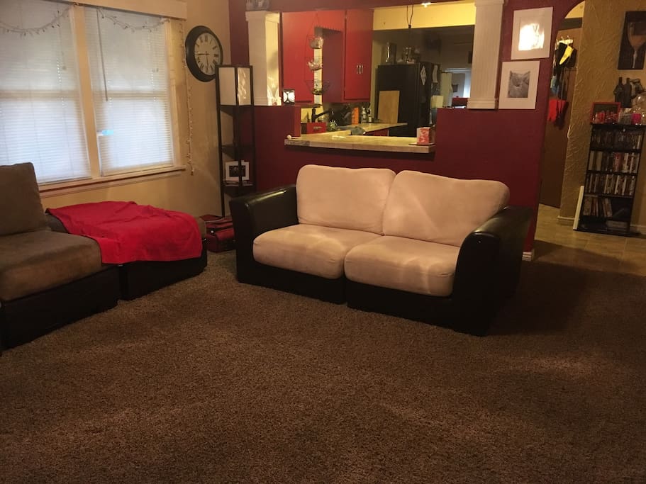 Spacious living room with comfy couches. Equipped with a PlayStation 3 and Netflix.