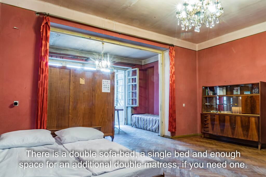 There is a double sofa-bed, a single bed and enough space for an additional double-mattress, if you need one.