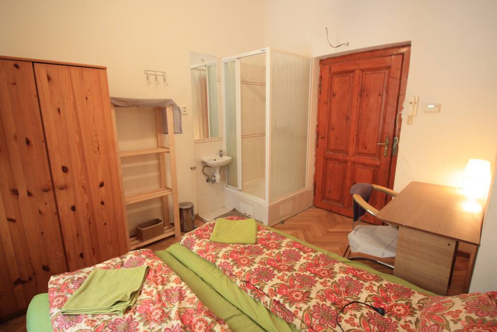 bedroom A , 2 beds ,writing desk, wardrobe, shower unit , ideal for couples