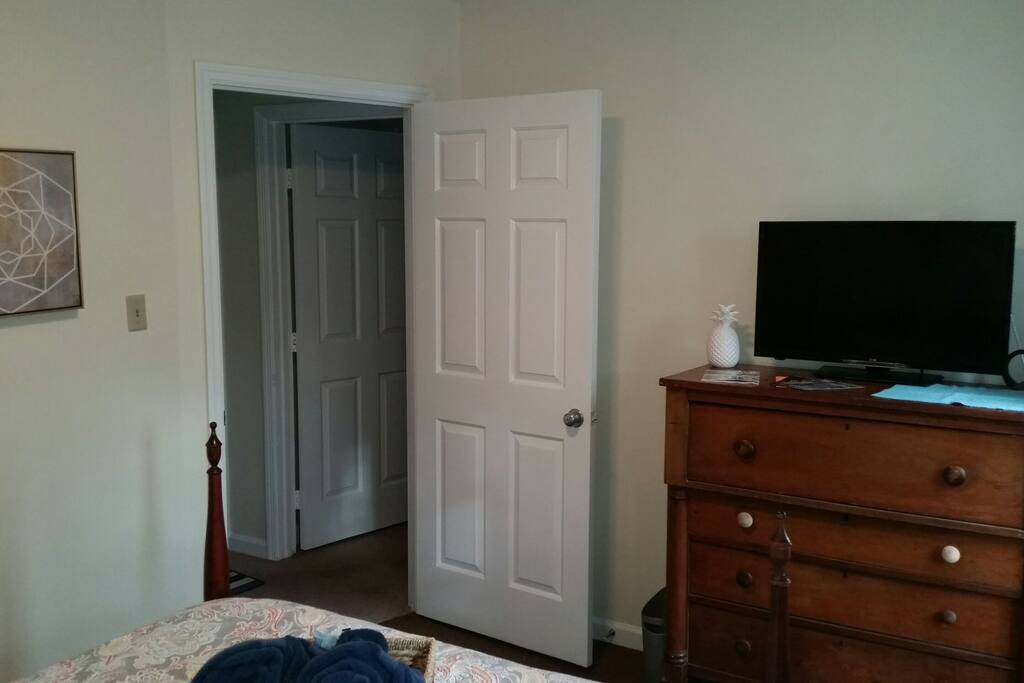 1800s dresser to counteract the 1980s ceilings.