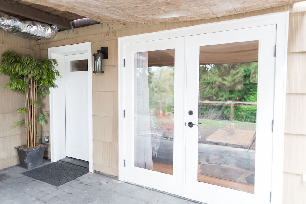 AirBnB unit front entrance (main floor deck under construction)