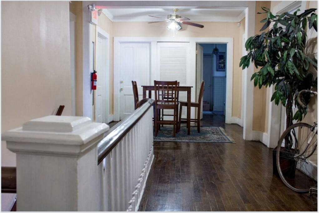 2nd Floor Common Area - Kitchen is located thru the open door to the Right