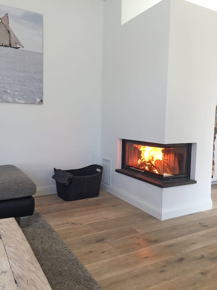Bright apartment with fireplace, sauna, garden & veranda