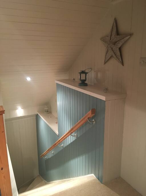 Stairs looking down from the master bedroom