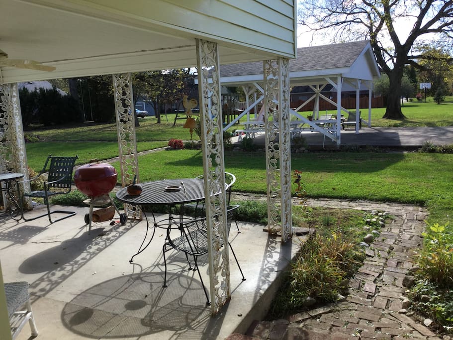 View of yard from side door to apartment