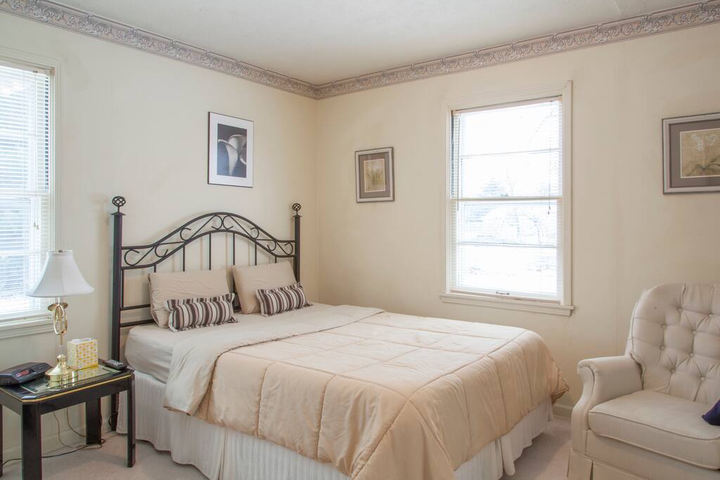 Queen size bed in bedroom two.