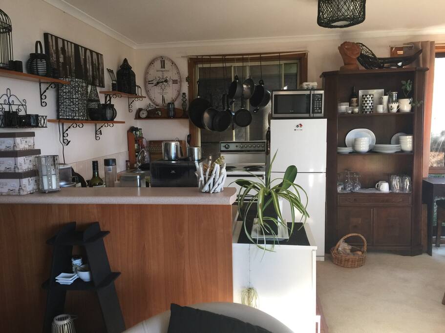 Kitchen with stove and family sized fridge