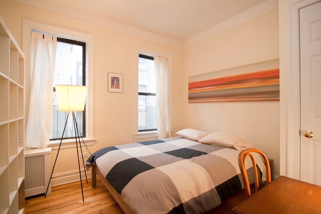 Master Bedroom with Queen size bed, closet and desk