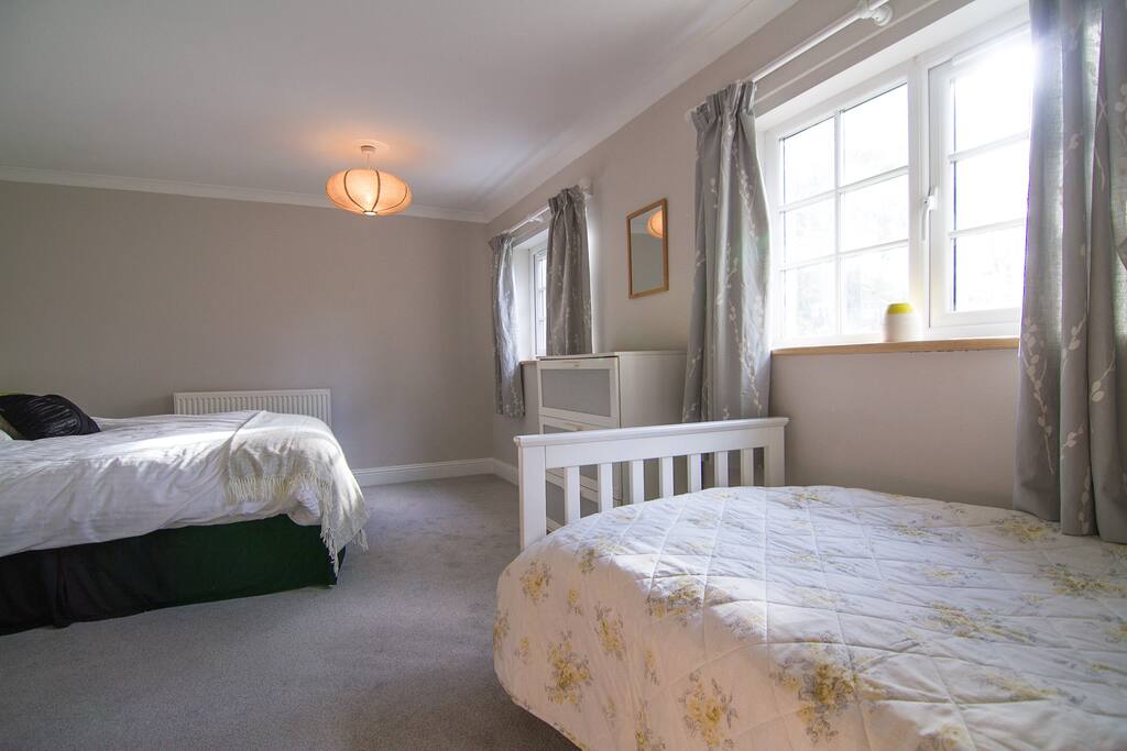 Bedroom 1 with 5ft double and a single bed.