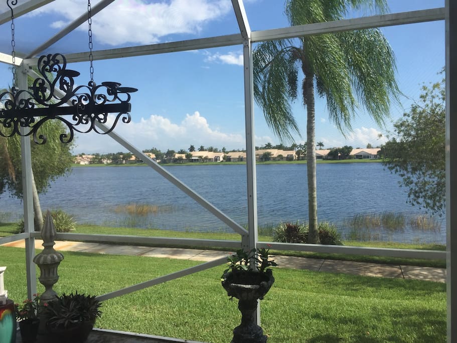Lake view from covered patio area with access from master bedroom and office.