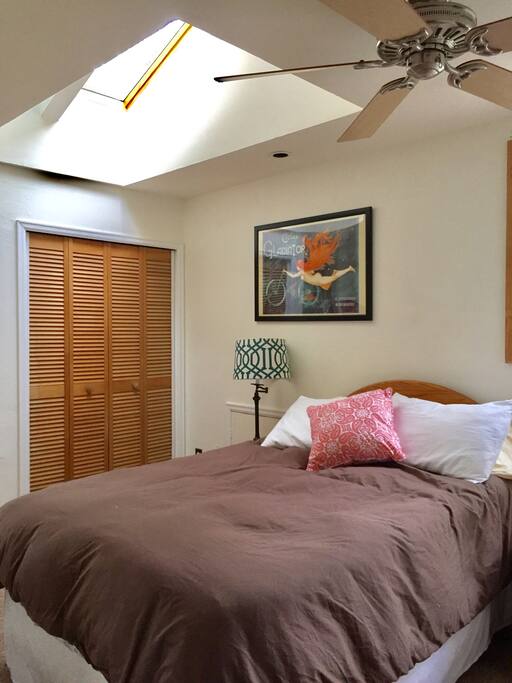 Skylights and ceiling fan help to keep the space nice and cool!