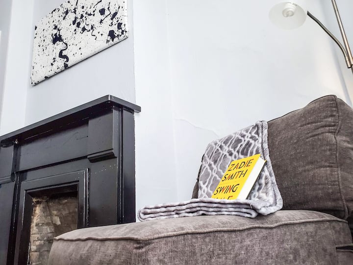 Perfect place to read a book, custom art pieces in the space.