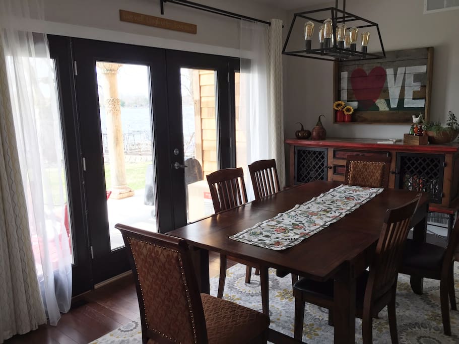 Dining room. Seats 6 comfortably. Walk out to patio. Open layout to kitchen and living room