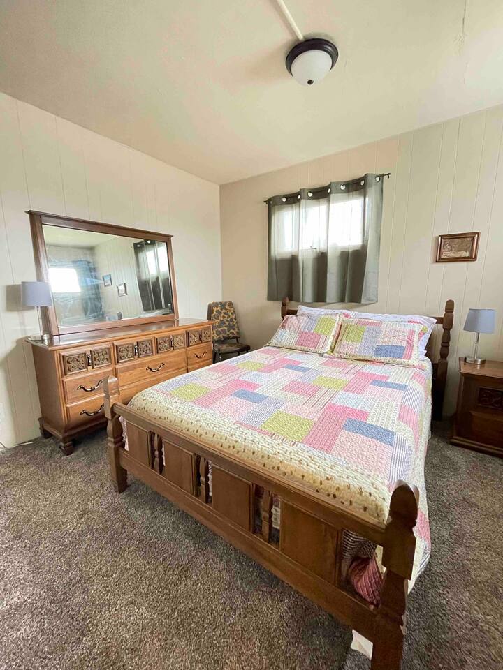 Double bedroom! Two small reading lights with USB charging ports. Night stand and dresser storage.