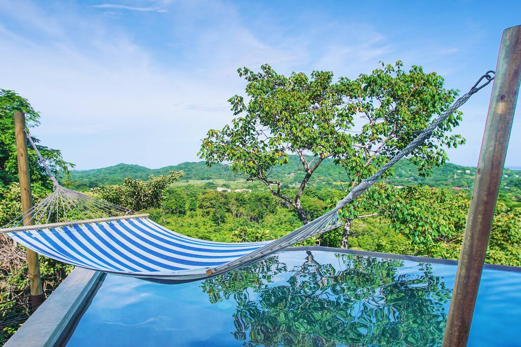 Hammock above water with impressive view