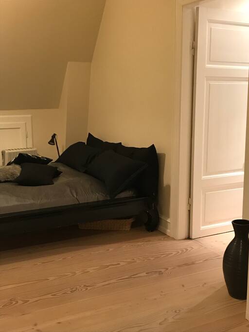 Bedroom and door to the hallway