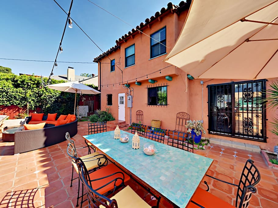 Plan an elegant dinner outdoors at the dining table for 8, and flip on overhead lights for a romantic touch.