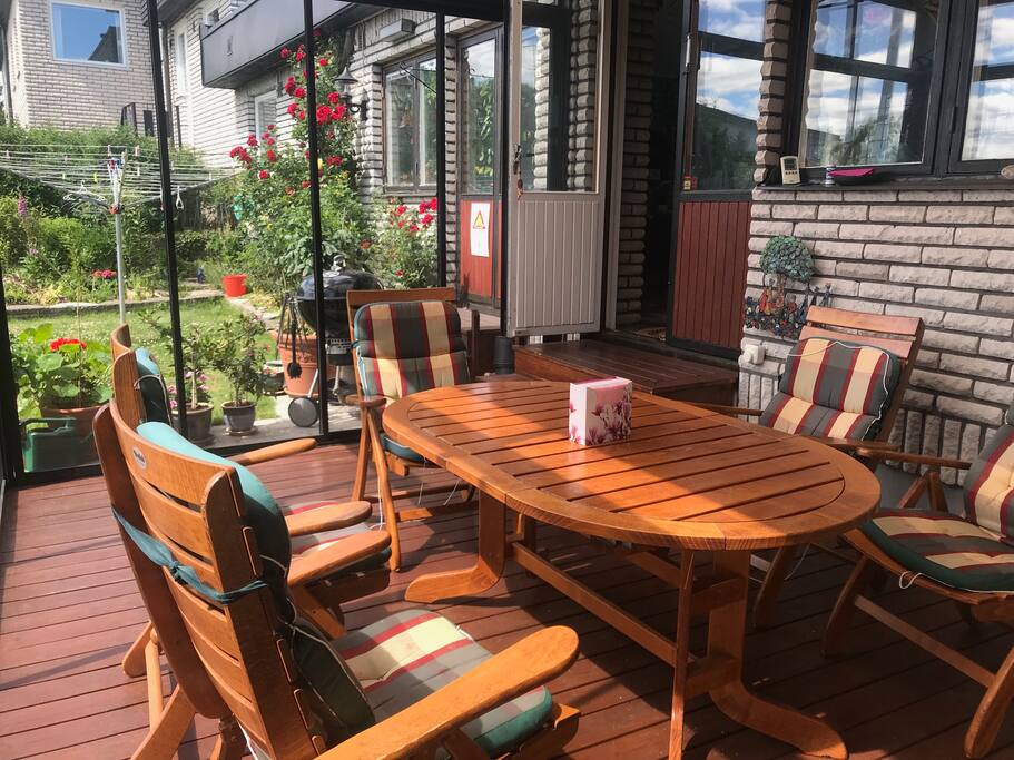 Glassed terrace in back yard