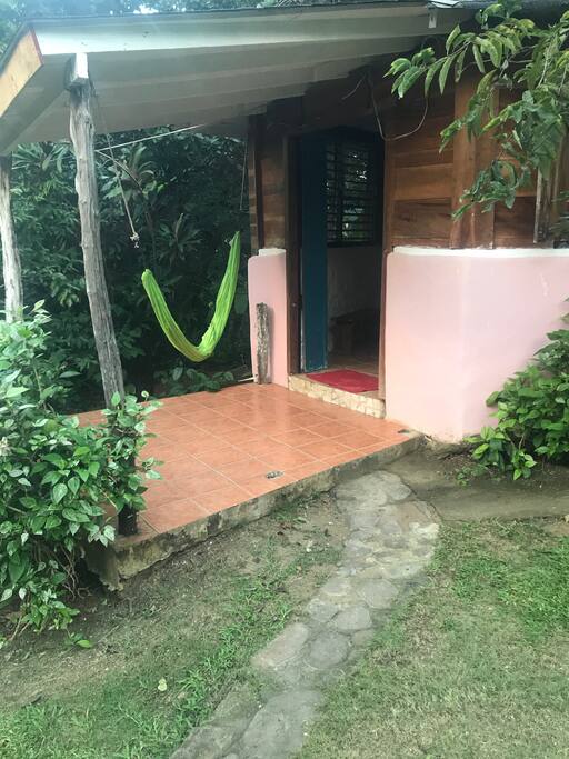 The Top Cabin and the little porch with hammock.