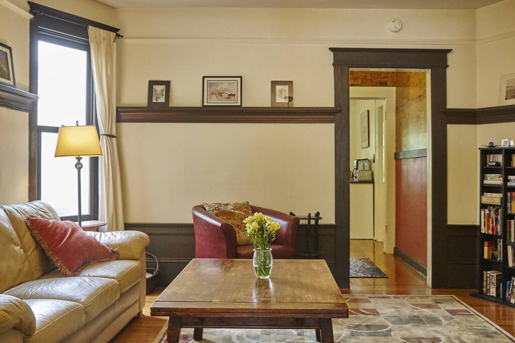 Living room with view toward butler's pantry