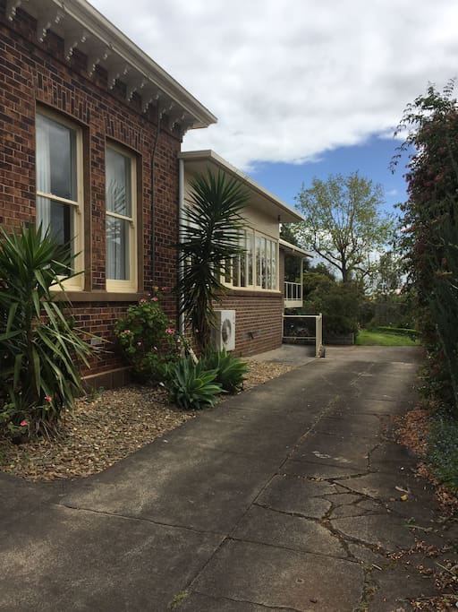 Driveway leading to rear.