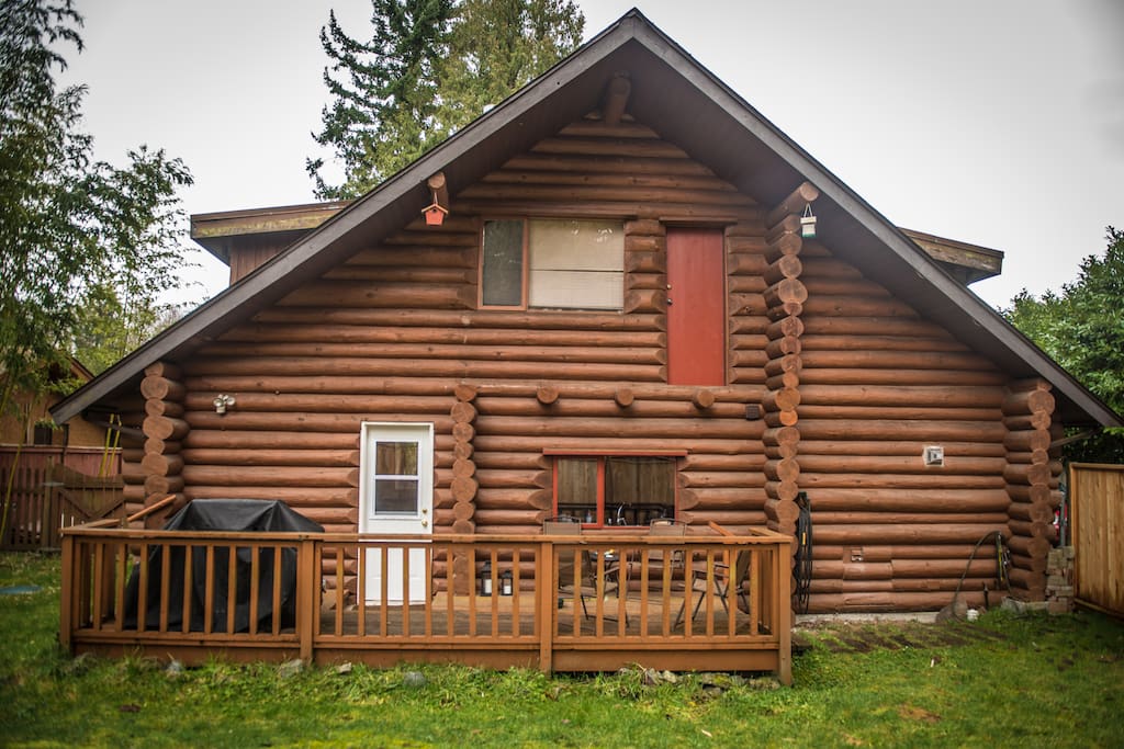 View of the cabin's back porch during the day.