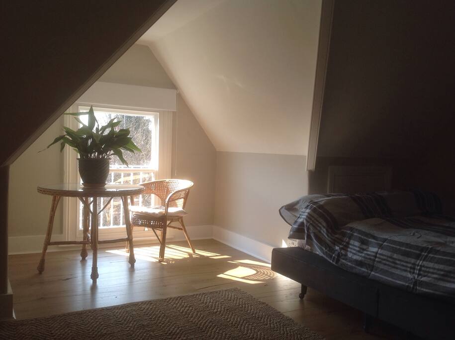 Spacious street facing room with table & chair!