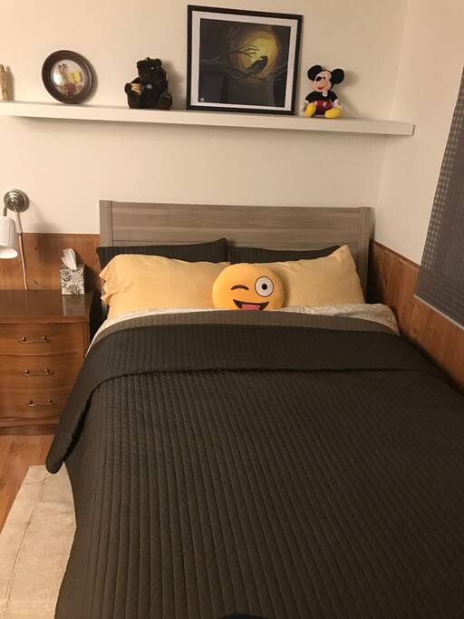 Full size bed includes a warm comforter and fresh pillows.