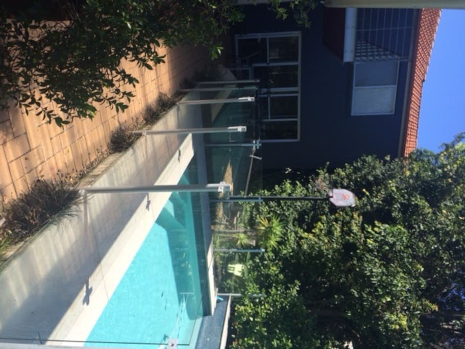 Pool area includes BBQ and outdoor seating