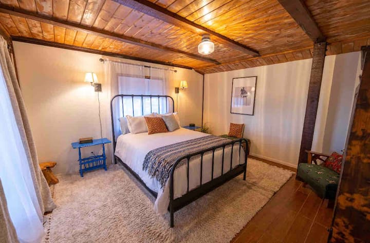 Room #3 queen bed and antiques. Right off kitchen and near entrance. 